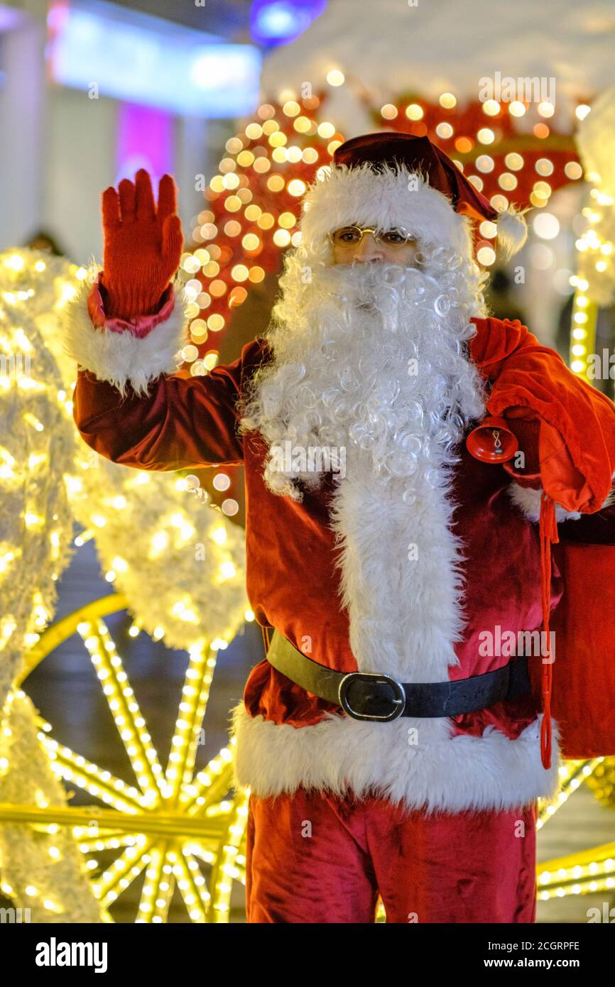 Belgrade / Serbia - December 20, 2018: Man dressed as Santa Claus in Knez Mihailova street, main pedestrian zone in Belgrade, Serbia Stock Photo