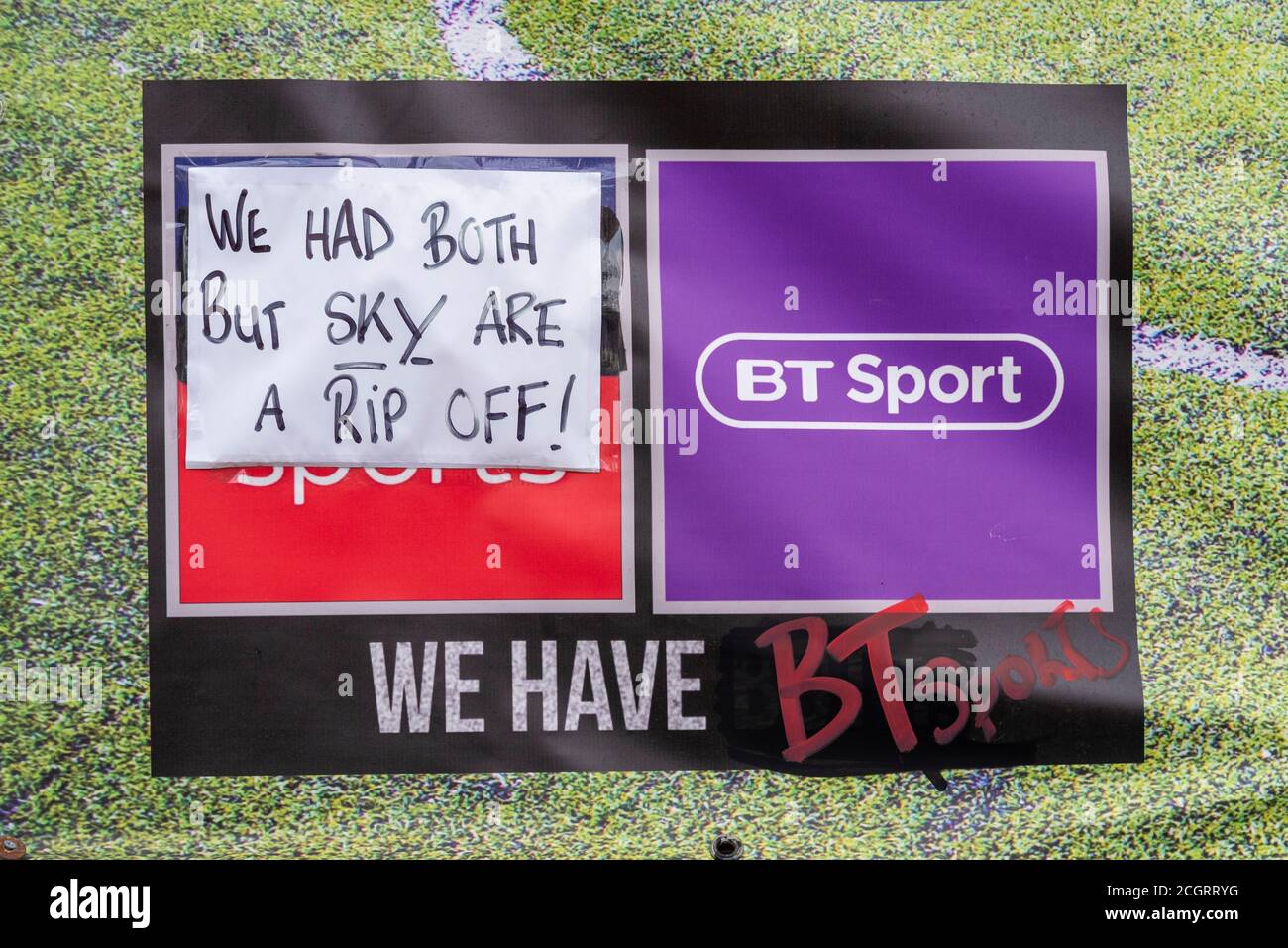 Abusive sign outside pub in Southend on Sea, accusing Sky television of being a rip off. Advertising BT Sport TV coverage for customers to watch Stock Photo