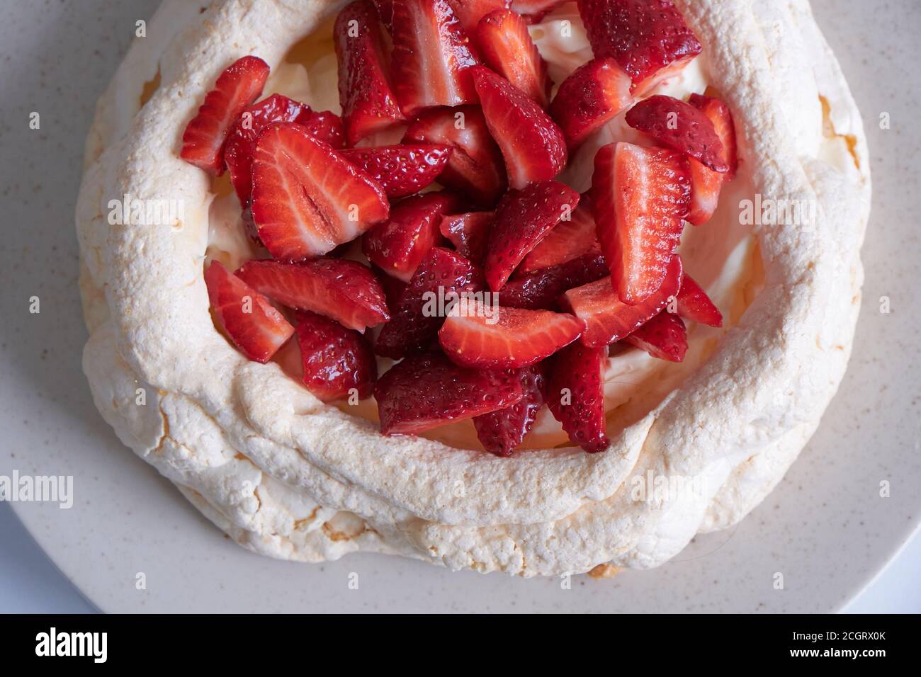 Australian Pavlova Meringue Cake, filled with Chantilly Cream, Dulce de