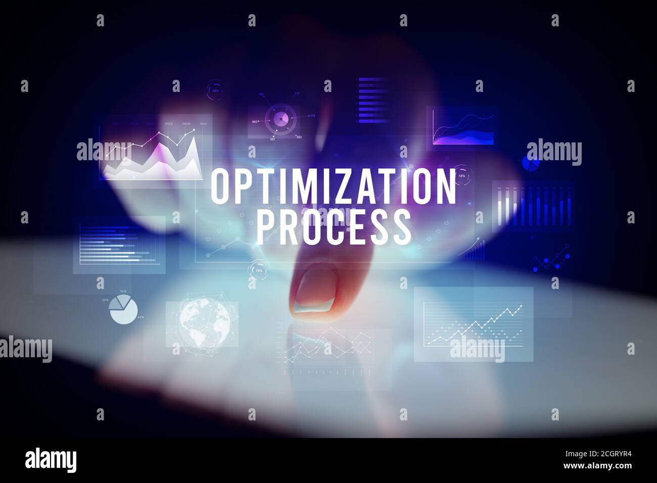 Finger touching tablet with charts and OPTIMIZATION PROCESS inscription ...