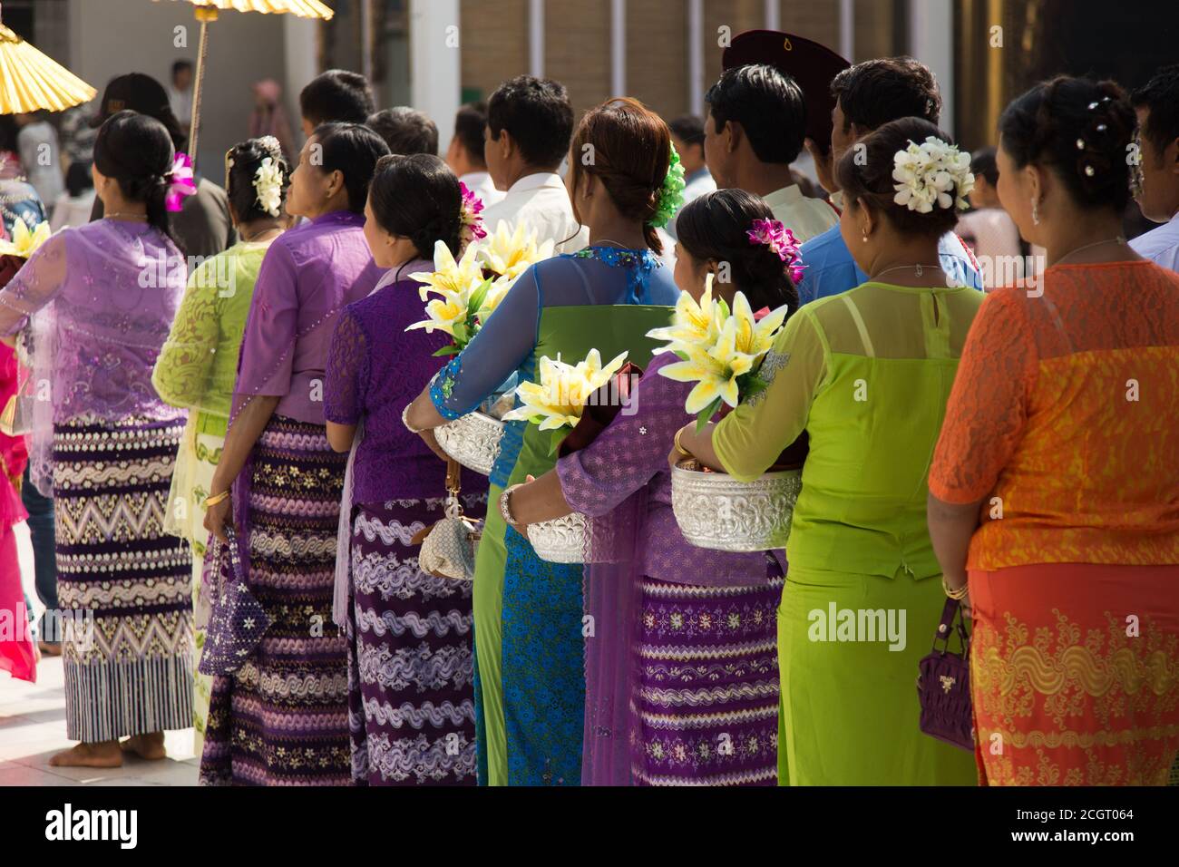 Mahamuni Temple Mandalay Myanmar 12/12/2015 ceremony with girls dressed in white Stock Photo