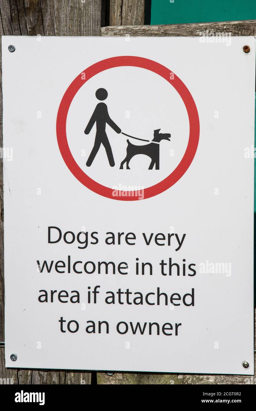 Warning sign in a local park that dogs are only permitted if kept on a lead Stock Photo