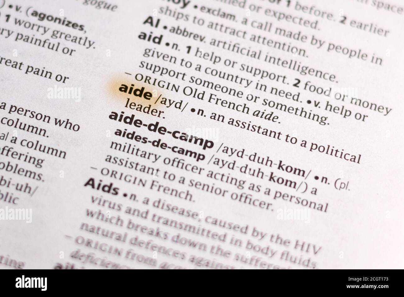 The word or phrase Aide in a dictionary highlighted with marker Stock ...