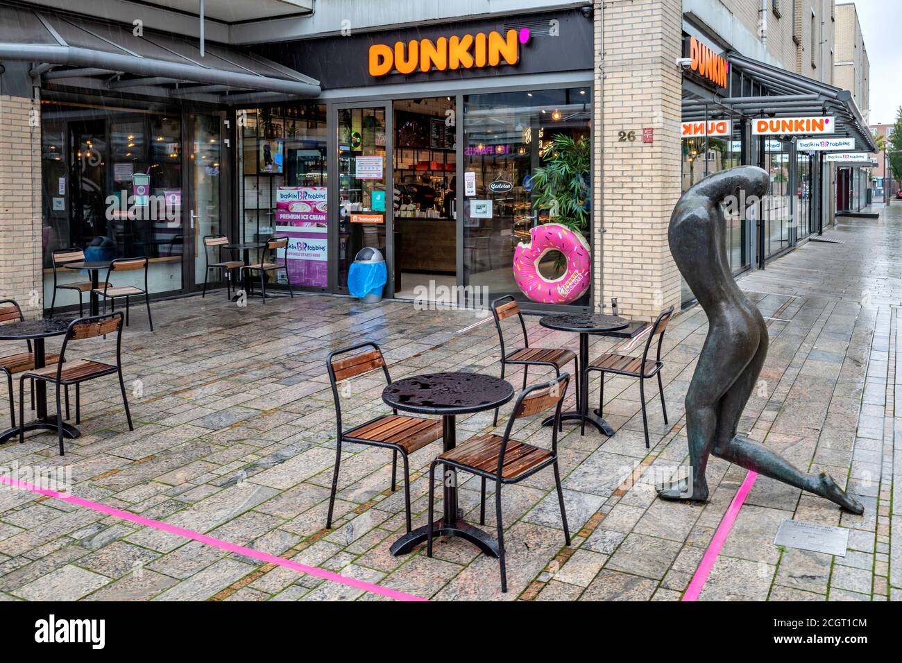 Dunkin’ Donuts branch in Almere, The Netherlands. Dunkin’ is an American multinational coffee and doughnut company. Stock Photo