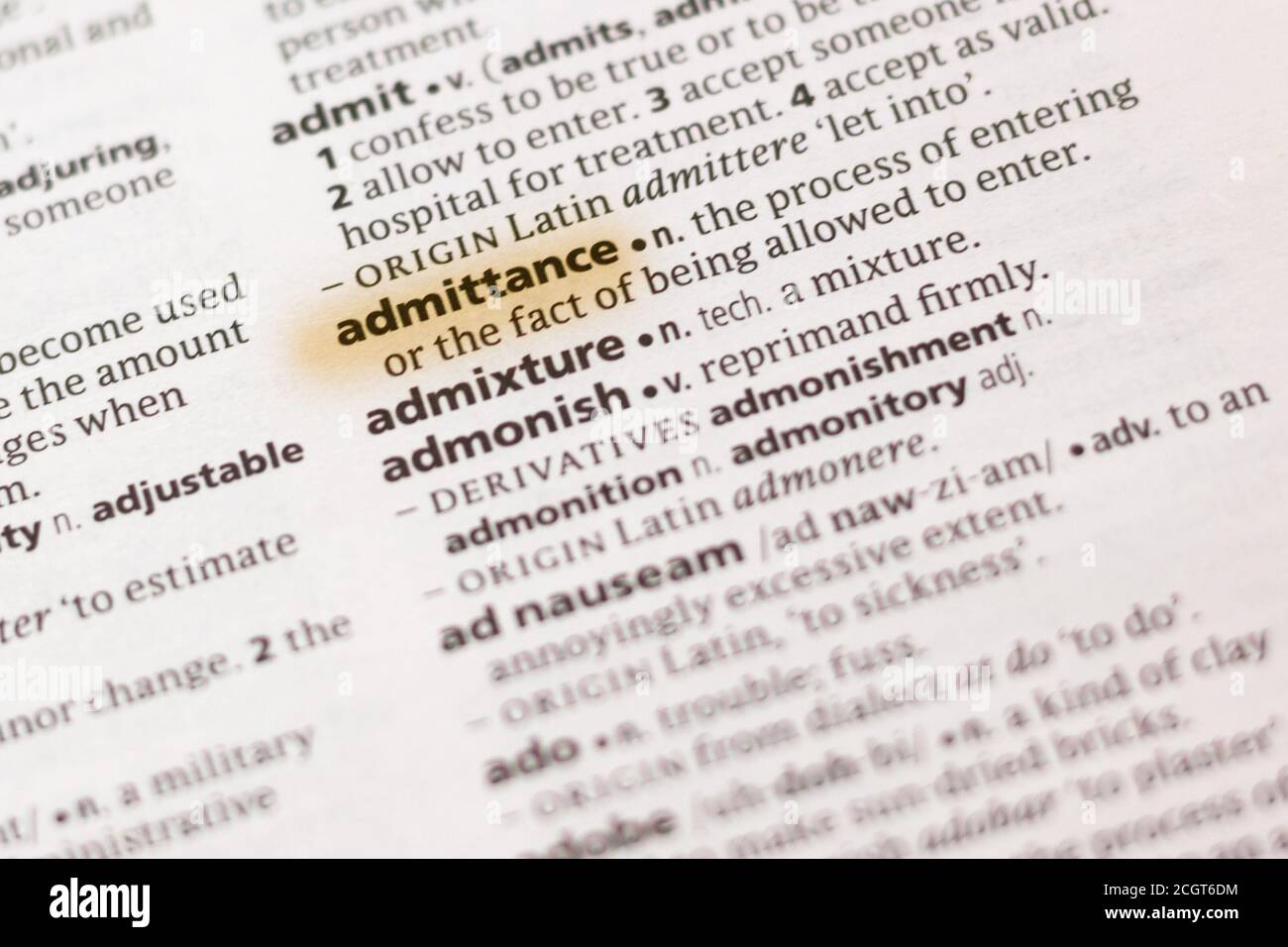 The word or phrase Admittance in a dictionary highlighted with marker ...