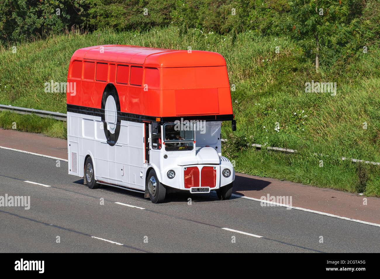 1960s 60s Rare Leyland Routemaster AEC Regent V - Registered 14/1/1966, 60s classic red & white vintage (target) restored old double decker bus motorhome conversion travelling on the M6 Motorway UK Stock Photo