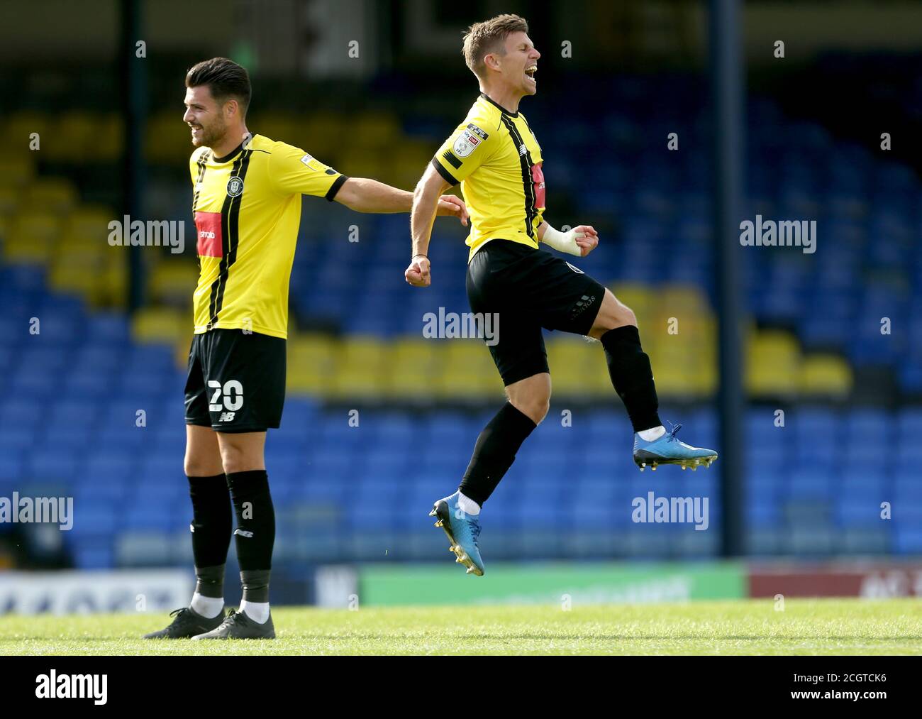 Harrogate Town's Lloyd Kerry (right) celebrates scoring his side's second goal of the game with teammate Connor Hall during the Sky Bet League Two match at Roots Hall, Southend. Stock Photo