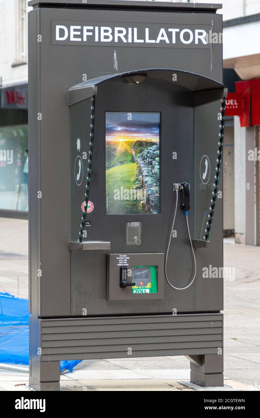 A defibrillator or AED in a telephone box on a high street, Commercial