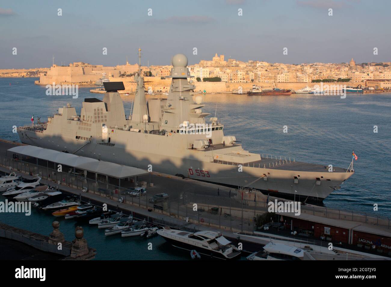 The destroyer Andrea Doria (D553) of the Italian Navy or Marina Miltare in Malta's Grand Harbour at sunset Stock Photo