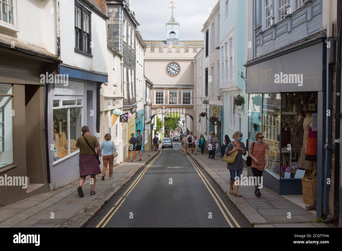 East Gate Tudor arch and clock tower in the High Street of Totnes, Devon, England, United