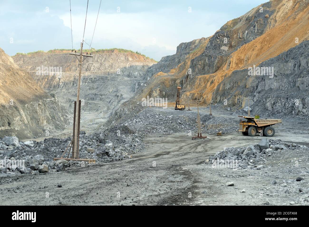 Tipper of Caterpillar during the work shift in a career. The quarry