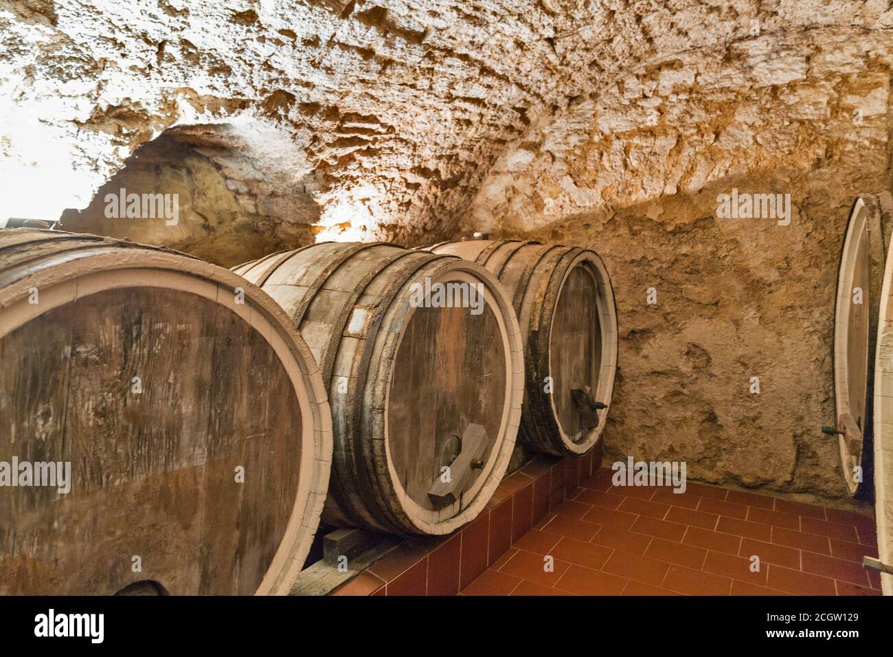 Wine wooden oak barrels closeup in the ancient cellar Stock Photo Alamy
