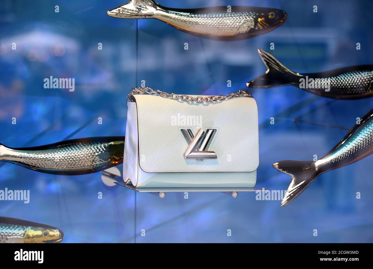 A Louis Vuitton handbag displayed on a white carrera marble background  Stock Photo - Alamy