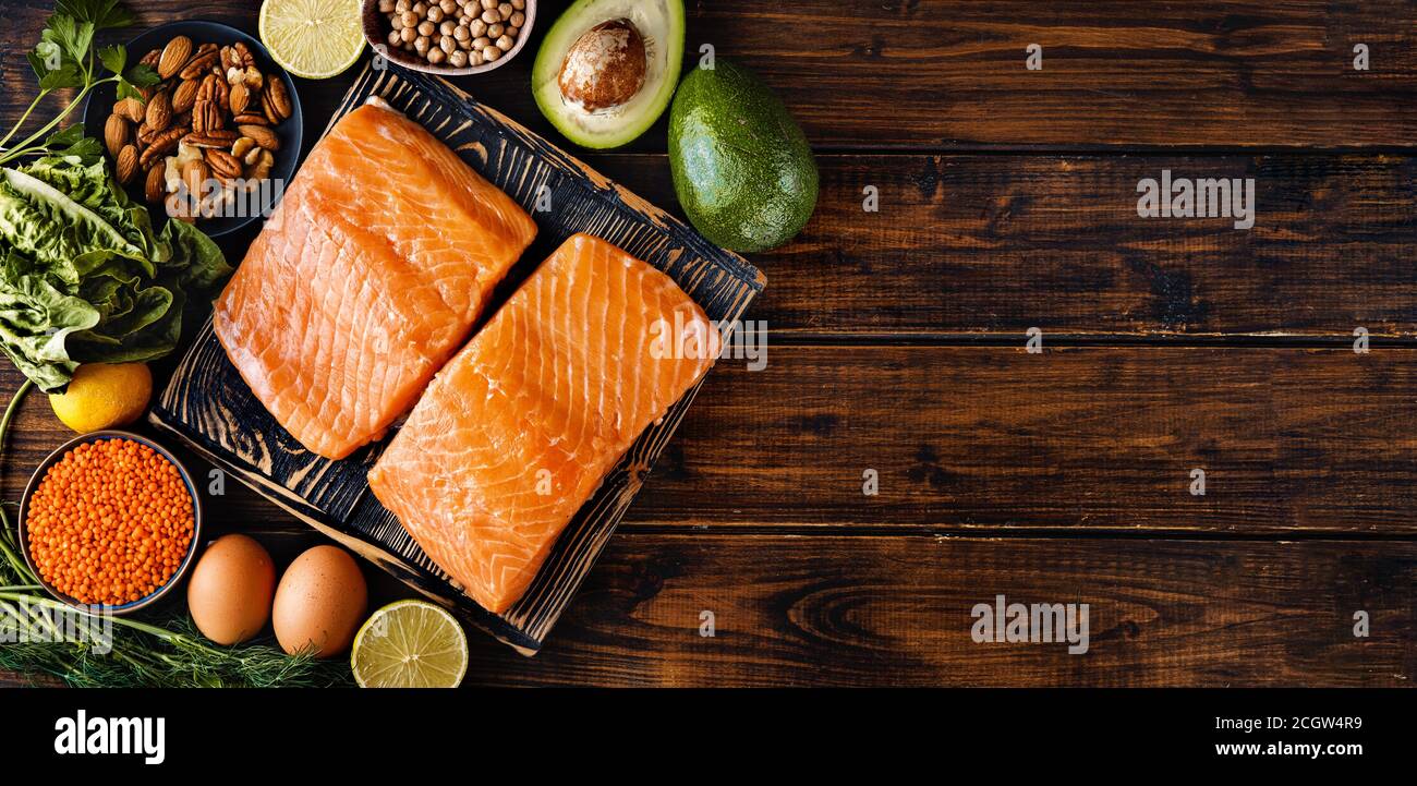 Flat lay of raw salmon fillet with healthy diet food products. Healthy ...