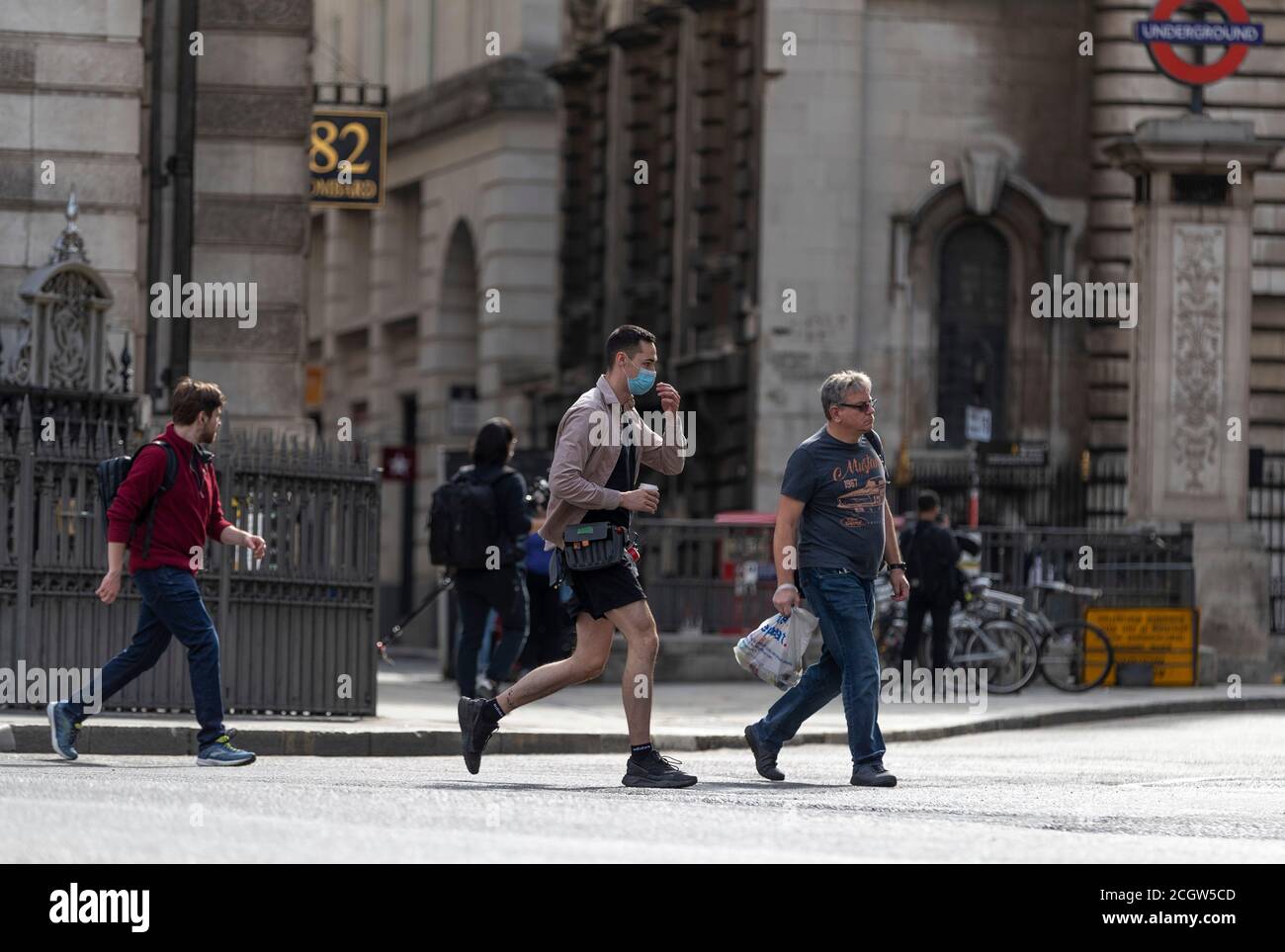 London, Britain. 12th Sep, 2020. People walk on a street in central London, Britain, on Sept. 12, 2020. Almost 8 million Britons will be subjected to tighter lockdown restrictions next week after fresh measures were imposed in the West Midlands and Scotland, local media reported Saturday. A study by Imperial College London found that coronavirus cases in England were doubling every seven to eight days at the beginning of September. Credit: Han Yan/Xinhua/Alamy Live News Stock Photo