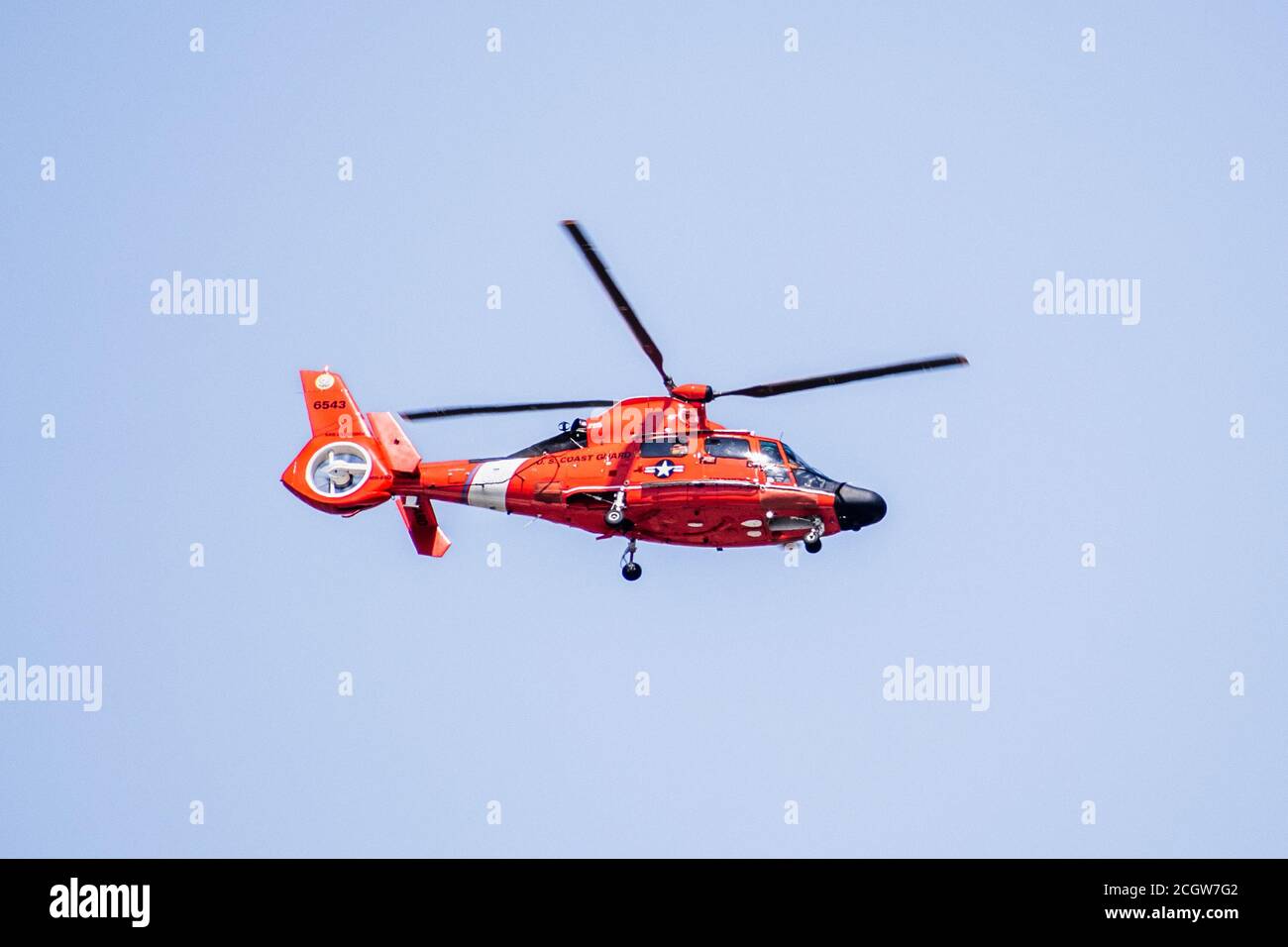 September 9, 2020 Sunnyvale / CA / USA - U.S. Coast Guard helicopter performing a flight in South San Francisco Bay Area; Stock Photo