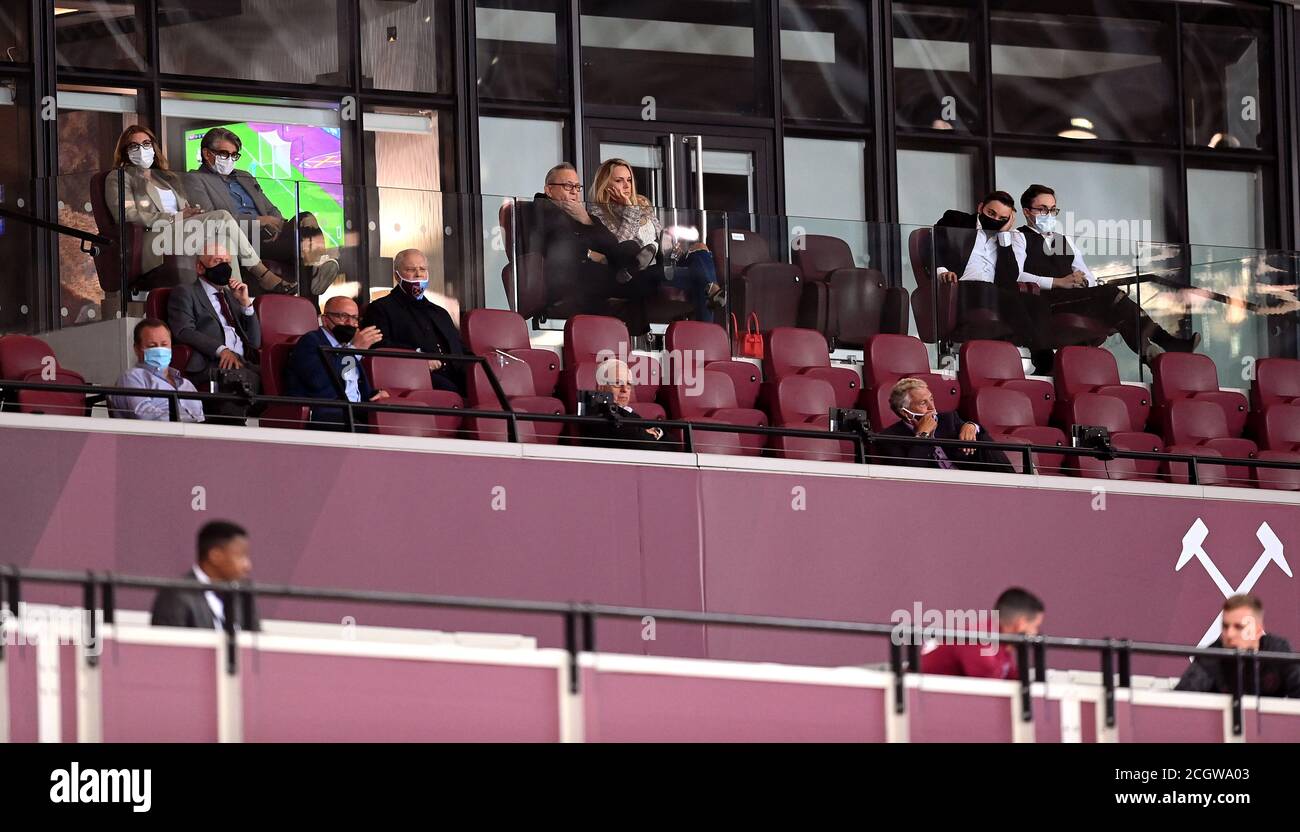 West Ham United’s Vice-chairman Karren Brady (top left), David Sullivan (top centre), Jack Sullivan (second from right top row), David Gold (second left middle row) and Newcastle United owner Mike Ashley (left front row) in the stands during the Premier League match at London Stadium. Stock Photo