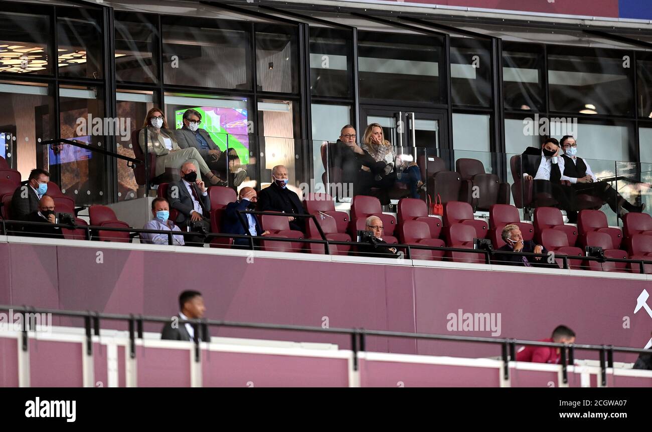 West Ham United’s Vice-chairman Karren Brady (top left), David Sullivan (top centre), Jack Sullivan (second from right top row), David Gold (second left middle row) and Newcastle United owner Mike Ashley (second left front row) in the stands during the Premier League match at London Stadium. Stock Photo