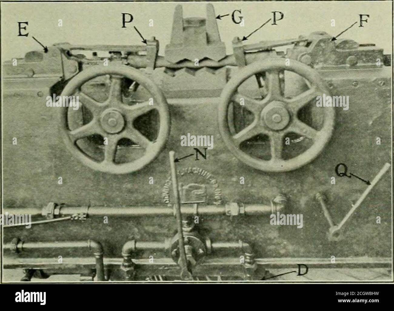 . Railway mechanical engineer . Fig. 2—Rear View Showing Cylinder Which Operates HoseClamping Head under special shear knives C without injury to hose clamps,the valve controlling this operation being operated by thefoot treadle L, thus leaving both hands free to hold the hose.On a test, one operator is said to have cut both clamp boltsfrom 140 hose in 20 min. After cutting the clamp bolts, the nipple end of the hoseis placed over the nipple puller M, which can be placed in. Fig. 3—Machine Equipped for Stripping Clamps and Fittings crosshead F; the operating lever .V is moved to the left,bring Stock Photo