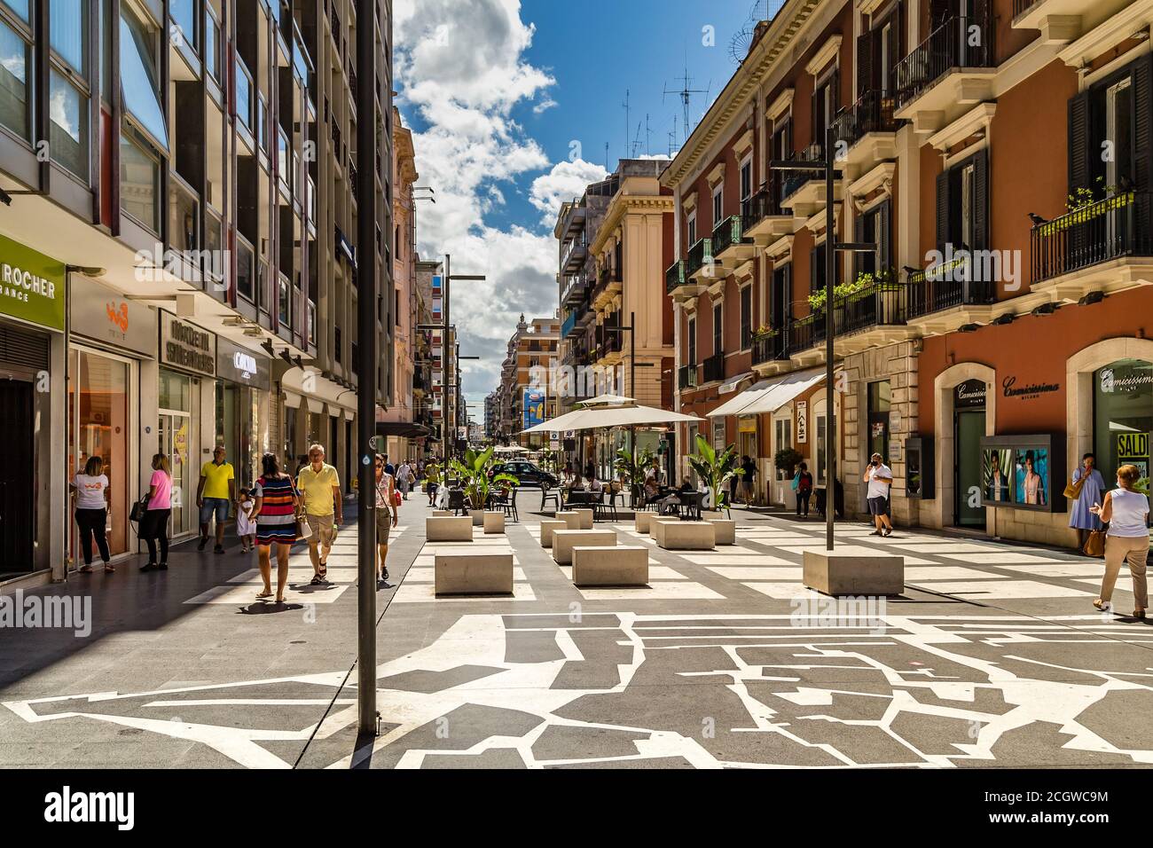 BARI, ITALY - SEPTEMBER 1, 2020: tourists walking in the street of Bari Vecchia Stock Photo