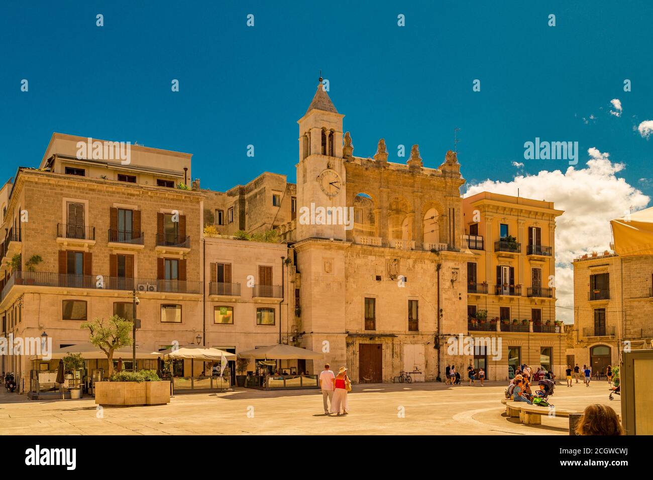 BARI, ITALY - SEPTEMBER 1, 2020: tourists walking in the square of Bari Vecchia Stock Photo