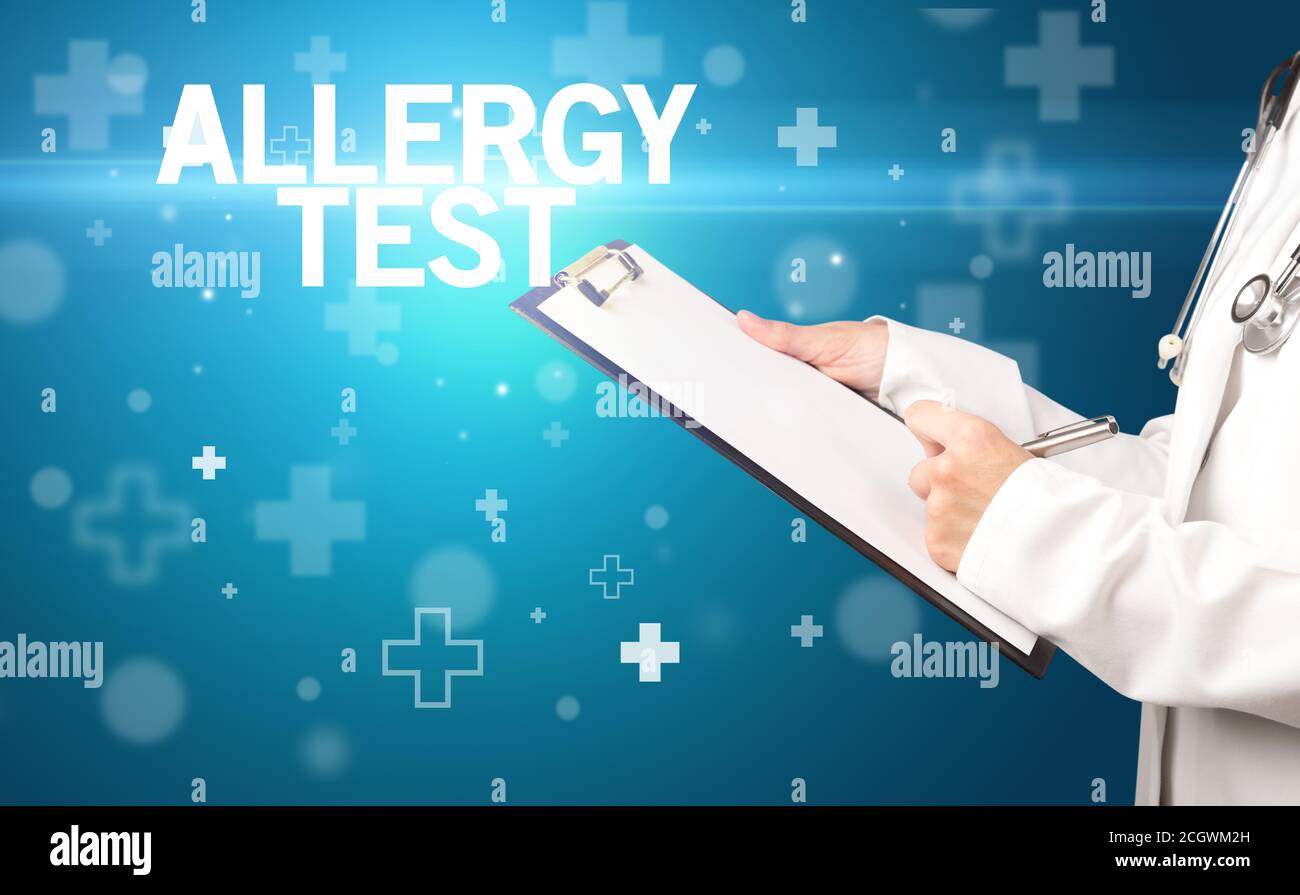 doctor writes notes on the clipboard with ALLERGY TEST inscription ...