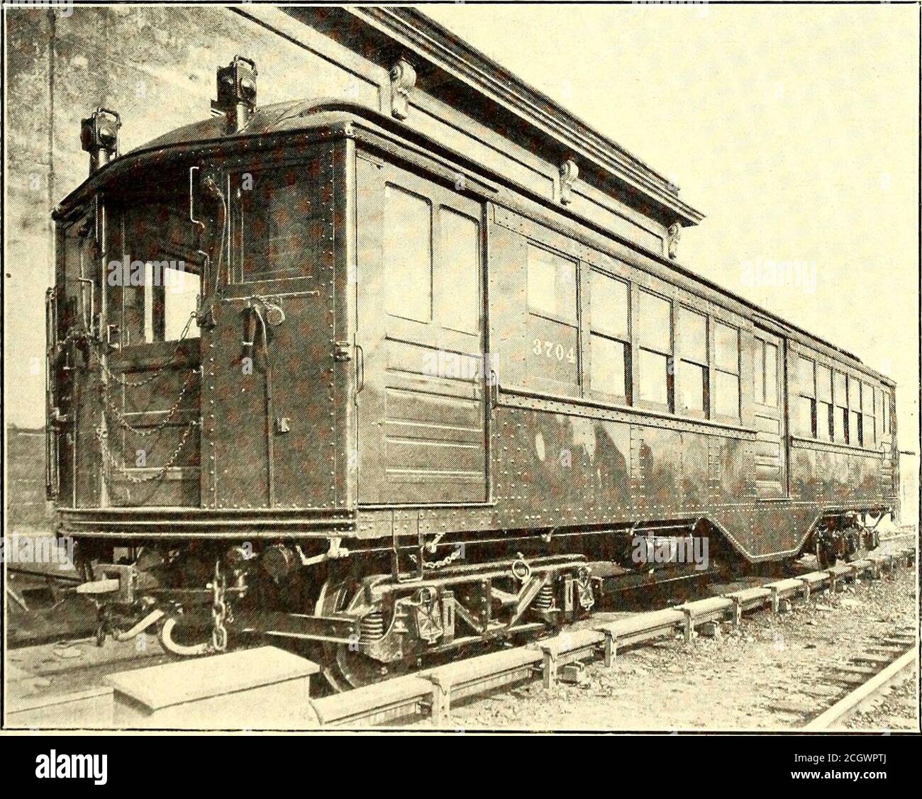 . Electric railway journal . in. plate riveted to theirwebs and extending 4 ft. outsideof the bolster and 5 ft. 3-ls-in. in-side of the bolster. The sidesills have similar plate 4 ft. 3 in.long riveted to the inside of thechannel webs. Built up bolstersmade of a %-in. x 9-in. top plateand a i-in. x 9-in. bottom plate-are used. The transverse floorbeams are 4-in. pressed steel chan-nels. In the center of the car thesills are stiffened by the needlebeams and two transverse dia-phragms between the needlebeams which brace the droppedside girders under the center dooropenings. The needle beams areb Stock Photo