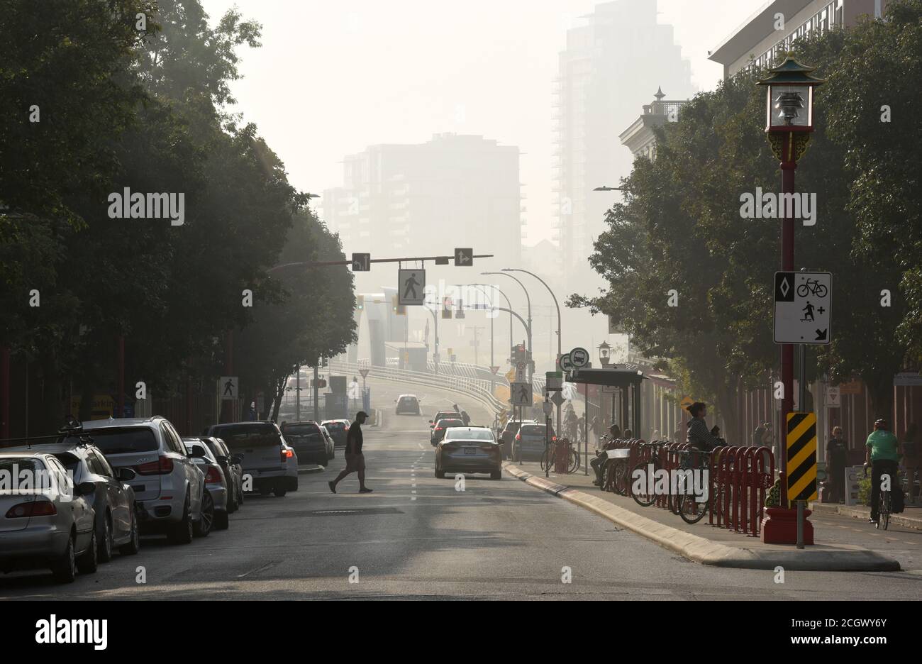 Smoke from forest fires and wildfires in Oregon and Washington State obscures buildings in downtown Victoria, British Columbia, Canada on Vancouver is Stock Photo