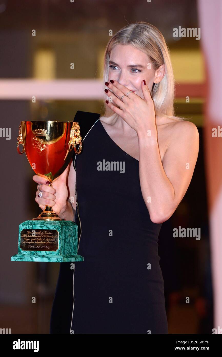 Vanessa Kirby posing with the Coppa Volpi for Best Actress during the Winners Carpet, 77th Venice International Film Festival, Venice, Italy, September 12, 2020. Photo by Ron Crusow/imageSPACE/MediaPunch Stock Photo