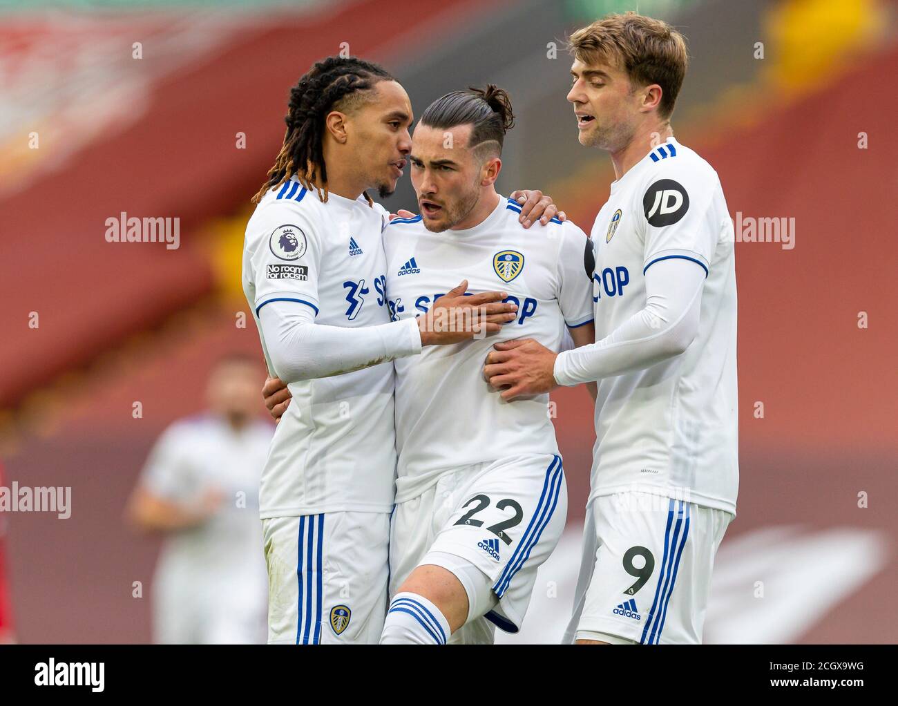 Liverpool. 13th Sep, 2020. Leeds United's Jack Harrison (C) celebrates scoring with teammates Helder Costa (L) and Patrick Bamford during the English Premier League match between Liverpool FC and Leeds United FC at Anfield in Liverpool, Britain, Sept. 12, 2020. Credit: Xinhua/Alamy Live News Stock Photo
