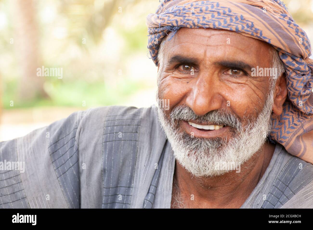 A farmer wearing arab traditional dress very happy Stock Photo