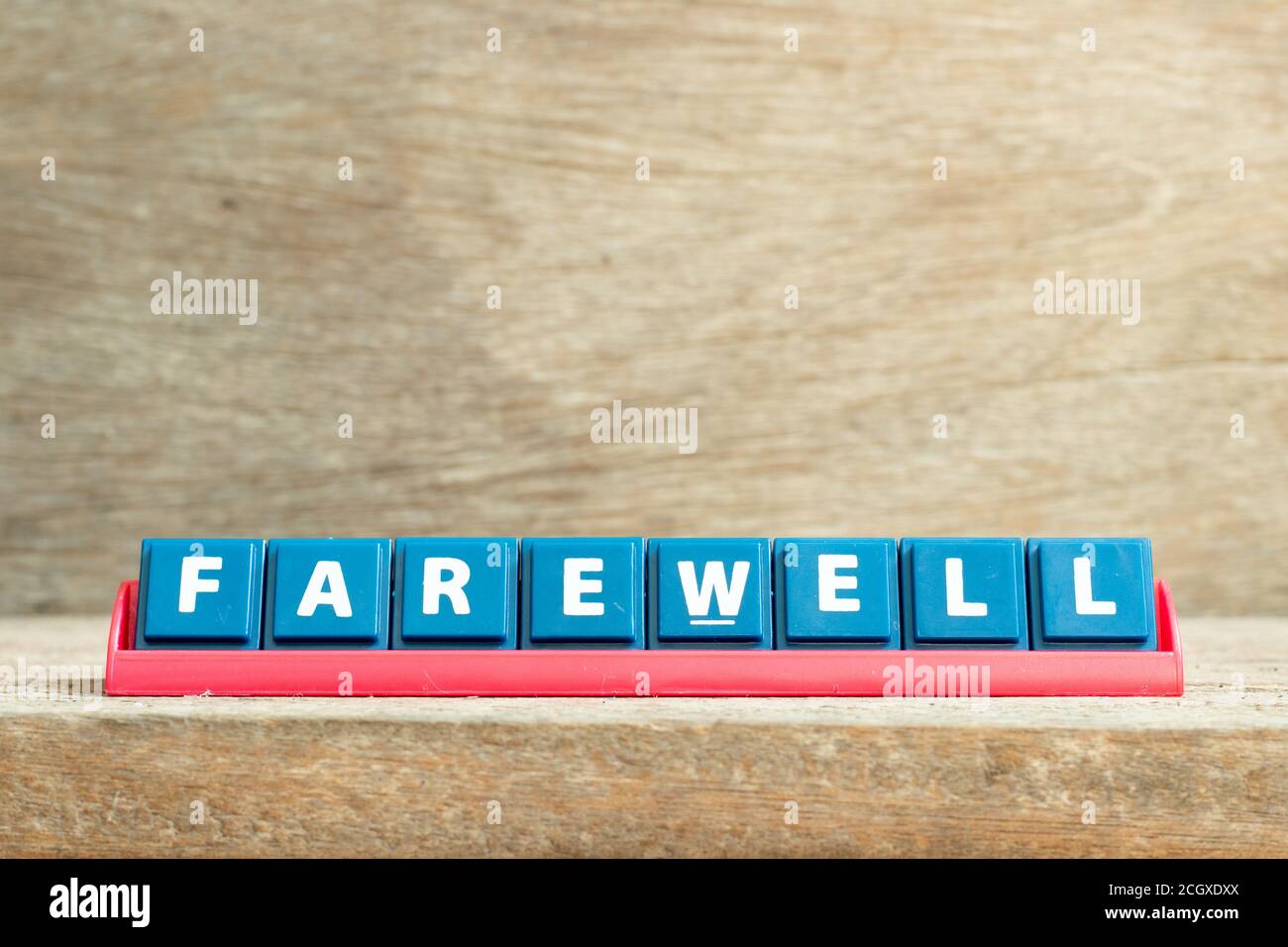 Tile letter on red rack in word farewell on wood background Stock Photo - Alamy Tile letter on red rack in word farewell on wood background Stock Photo - Alamy
