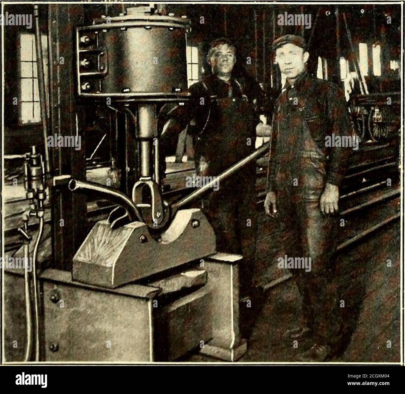 . Electric railway journal . Fig. 5—Boston & Northern Shops—Babbitting Devicefor Three Pairs of Sleeves coils, cleaning the coil surface, while one of two layers oftape are left on. The boiler supplying the steam pressurenecessary is connected with the vacuum chamber, in which arecoils for steam heating. The vacuum pump is operated by anelectric motor, together with a paddle in the melting tank.When the plant is in operation one man handles the boiler and. Fig. 7—Boston & Northern Shops—Pipe Bender two strip the coils after treatment. The exhaustion of theair in the chamber and the introductio Stock Photo
