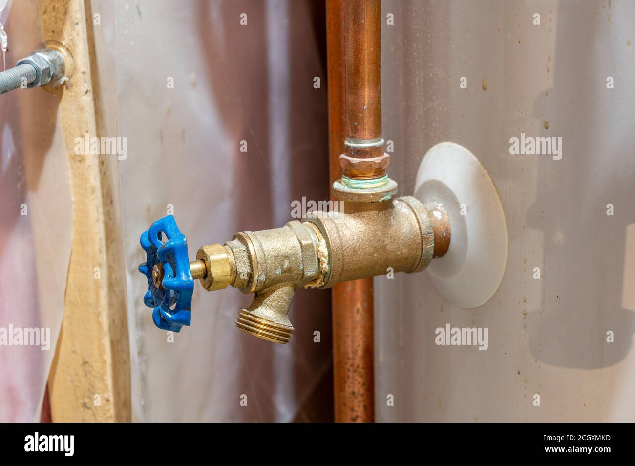 Drain valve located at the base of a water heater for annual