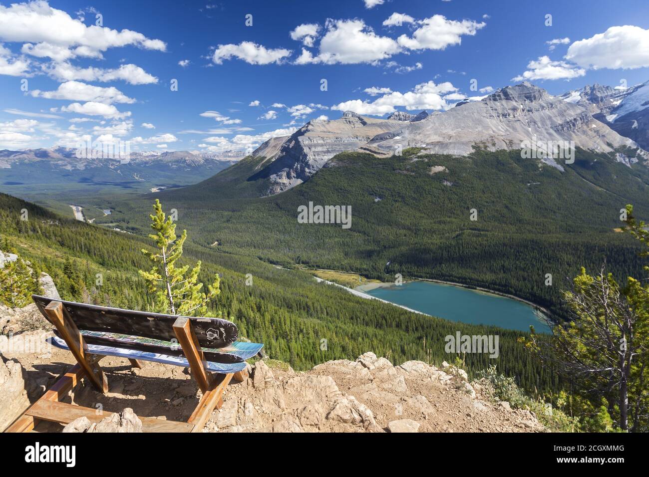 Wooden Bench and Scenic Canadian Rocky Mountains Panorama from Paget