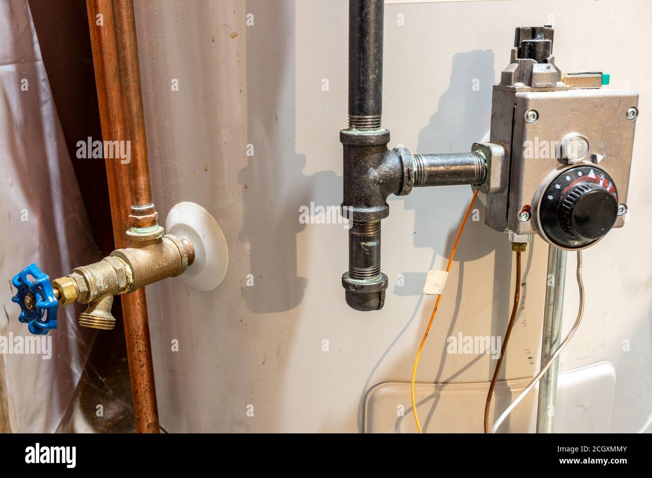 Drain valve located at the base of a water heater for annual