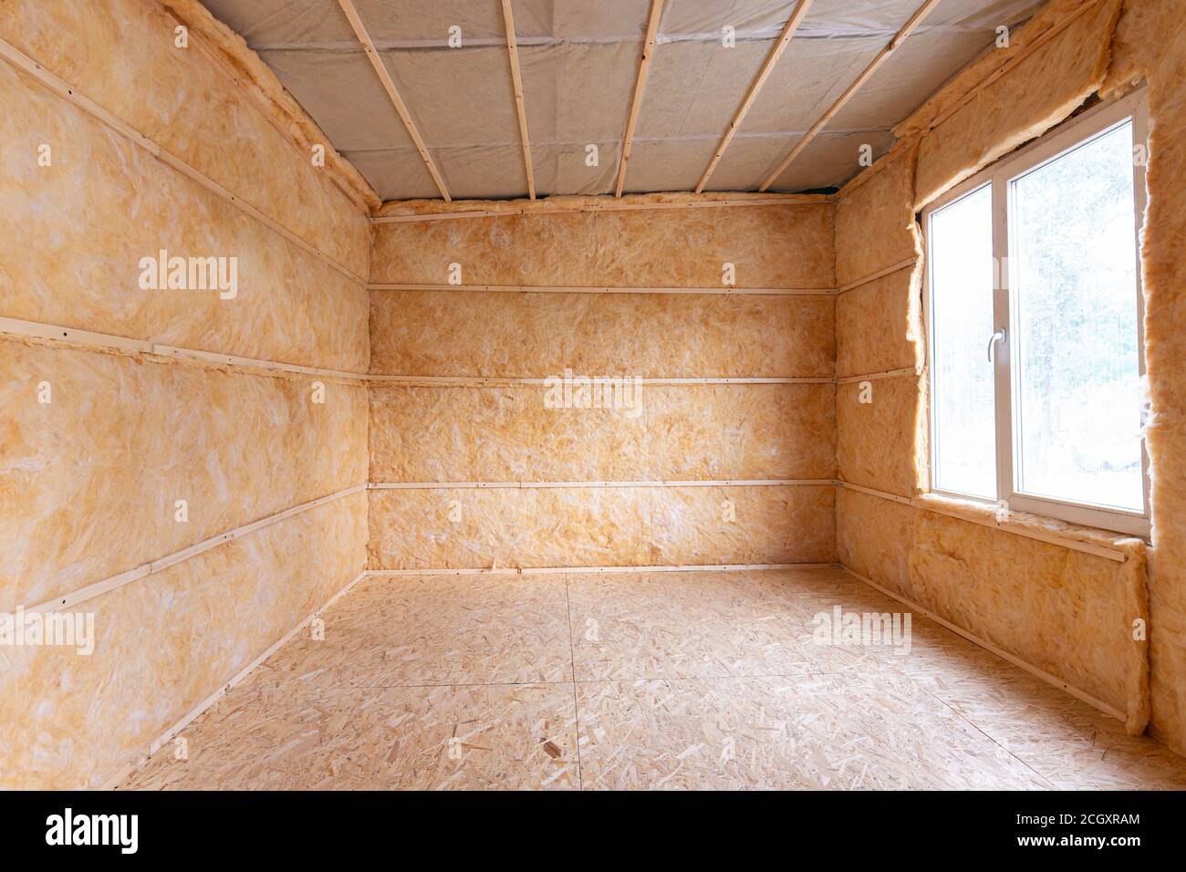 Roll insulation on the inner walls of a small room Stock Photo - Alamy - Living Room Wall Insulation For Small Spaces