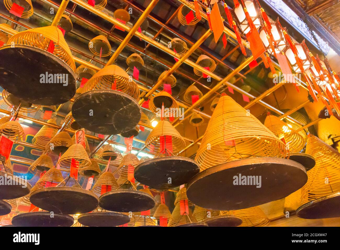 Sheung Wan, Hong Kong - Circular incenses at Man Mo Temple in Sheung Wan, Hong Kong. a famous Tourist spot. Stock Photo