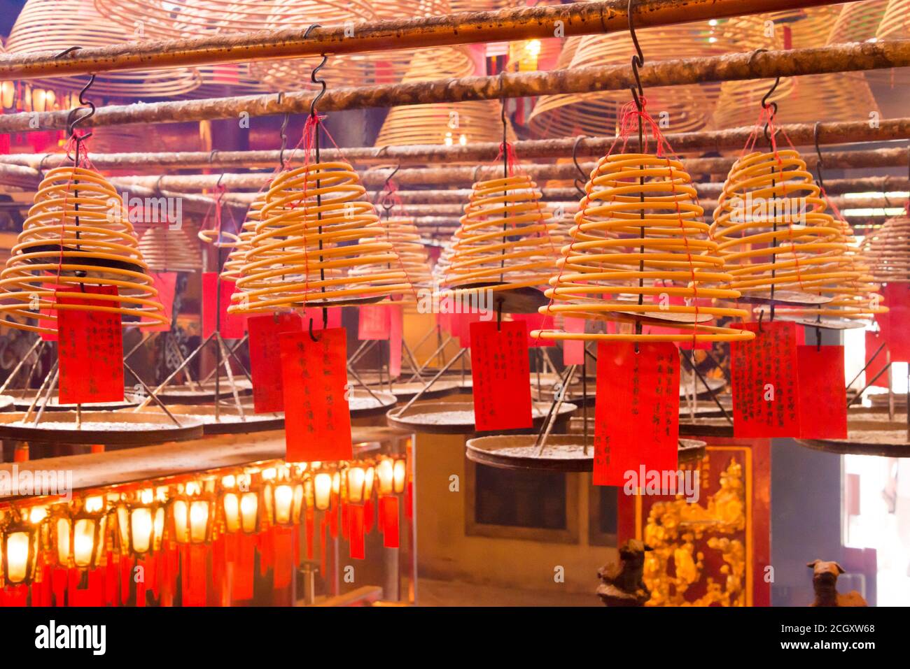 Sheung Wan, Hong Kong - Circular incenses at Man Mo Temple in Sheung Wan, Hong Kong. a famous Tourist spot. Stock Photo