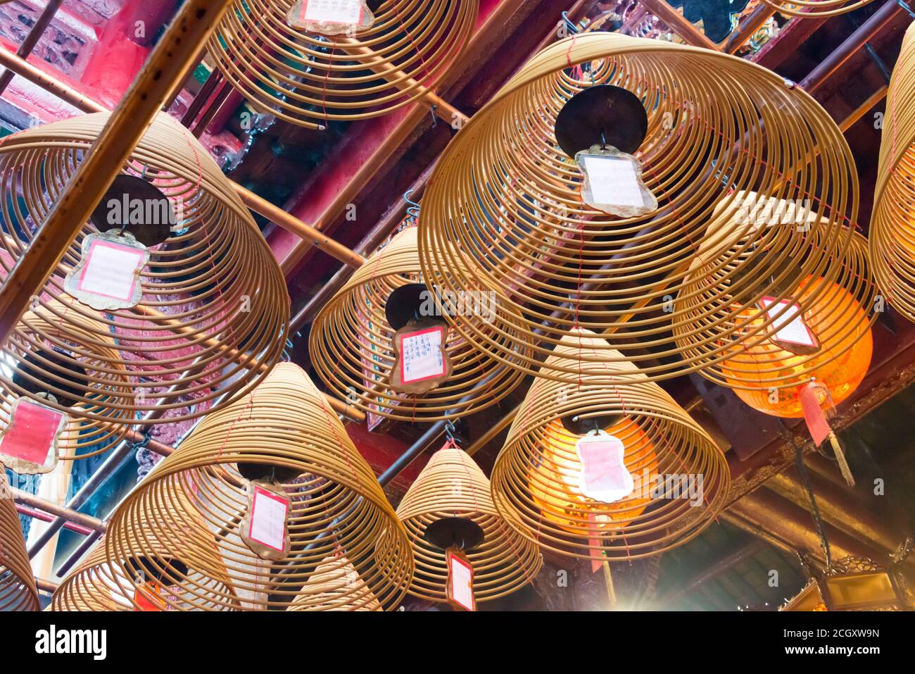 Sheung Wan, Hong Kong - Circular incenses at Man Mo Temple in Sheung Wan, Hong Kong. a famous Tourist spot. Stock Photo