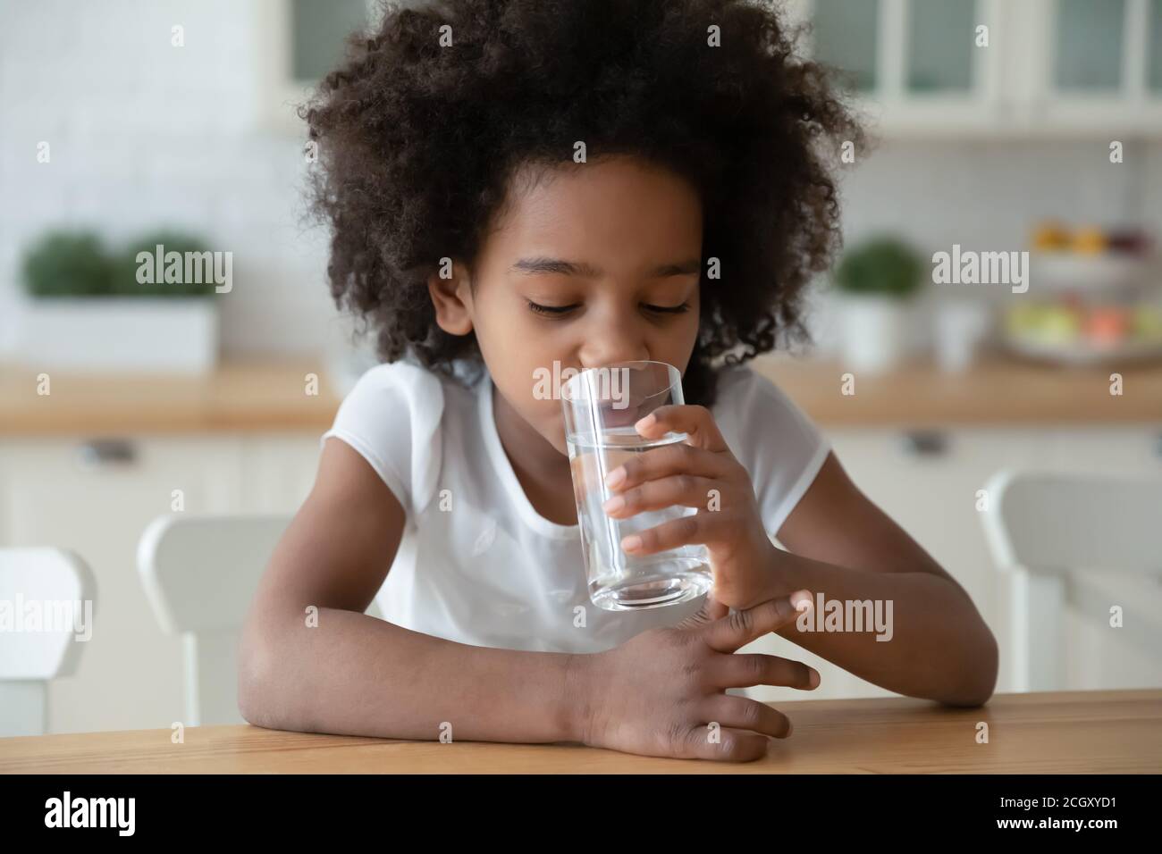 African american child drinking water hires stock photography and