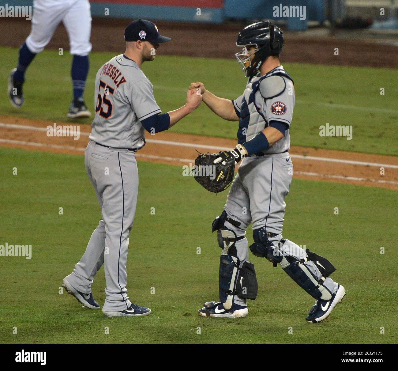 Los Angeles, United States. 13th Sep, 2020. Houston Astros' reliever fist bumps with catcher Mart'n Maldonado after earning his ninth save with a 7-5 win over the Dodgers at Dodger Stadium in Los Angeles on Saturday, September 12, 2020. Photo by Jim Ruymen/UPI Credit: UPI/Alamy Live News Stock Photo