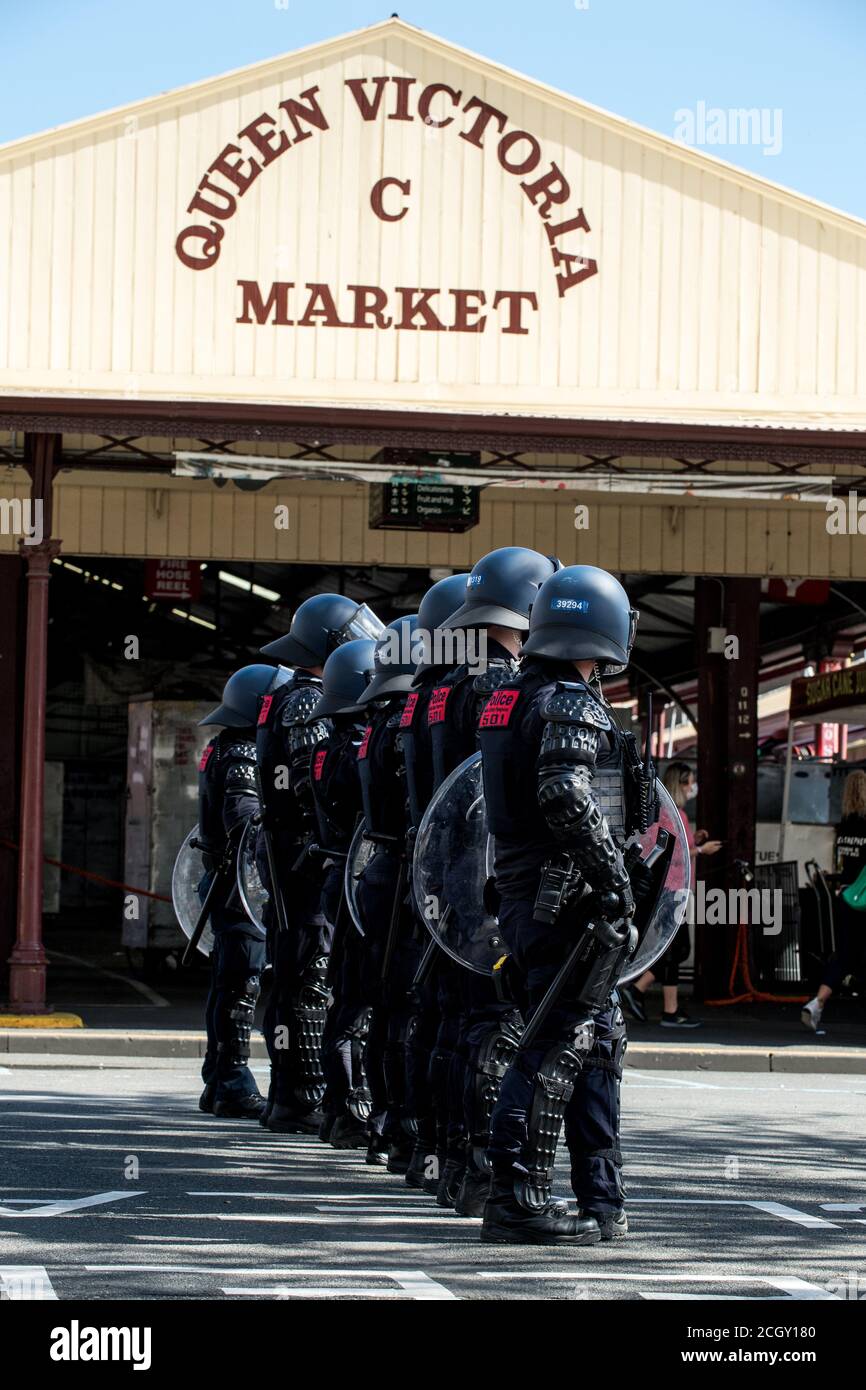 Melbourne, Australia. 13th Sep, 2020. Victorian police riot squad officers form up at the Queen Victoria Markets, where anti-mask and anti lockdown protesters had planned a popup protest, Melbourne Australia. Credit: Michael Currie/Alamy Live News Stock Photo