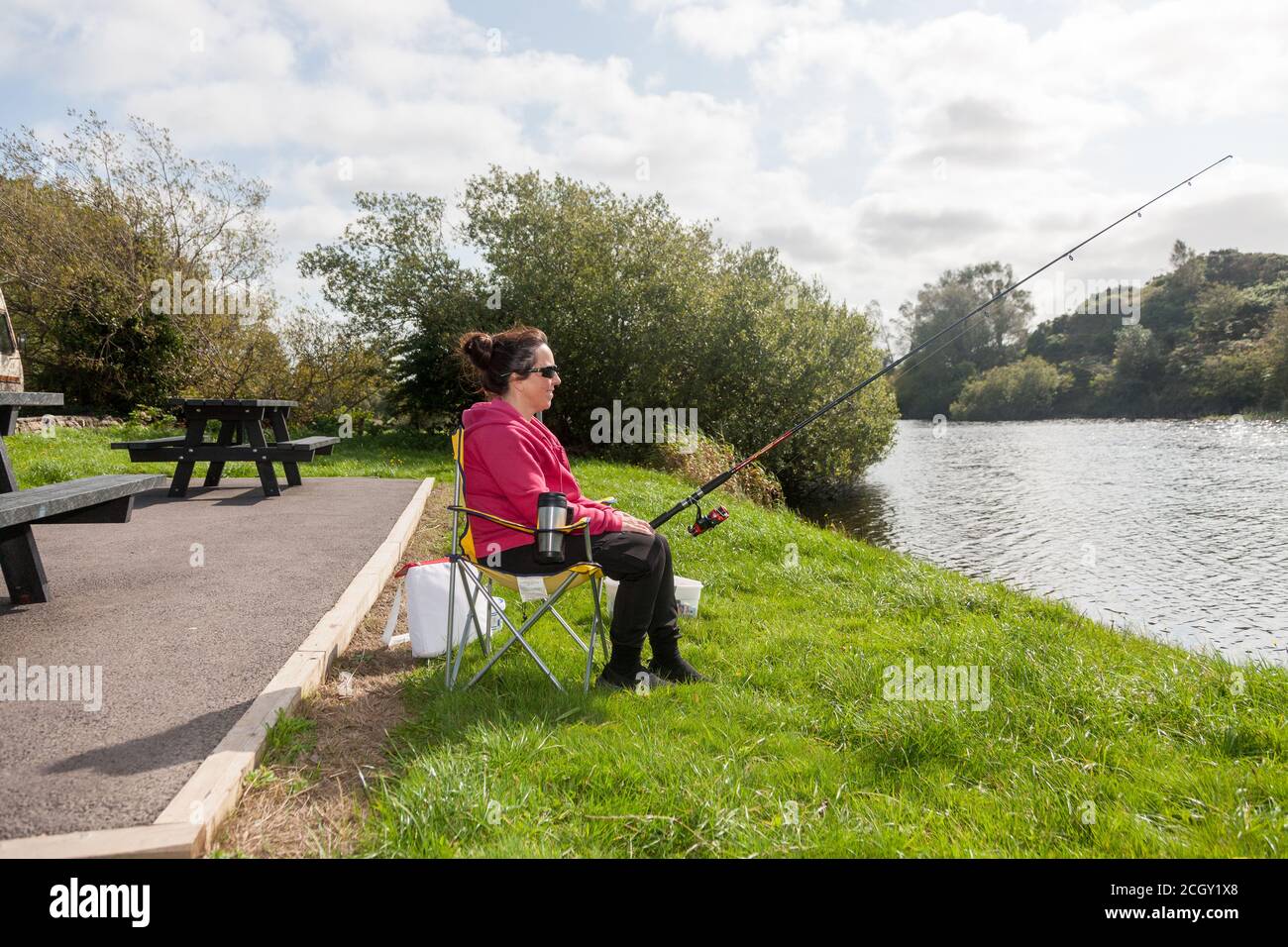 Inchigeelagh, Cork, Ireland. 12th September, 2020. Clare O' Connor from Coachford spending a relaxing afternoon course fishing on Lough Aulla outside Inchigeelagh, Co. Cork, Ireland. - Credit; David Creedon / Alamy Live News Stock Photo