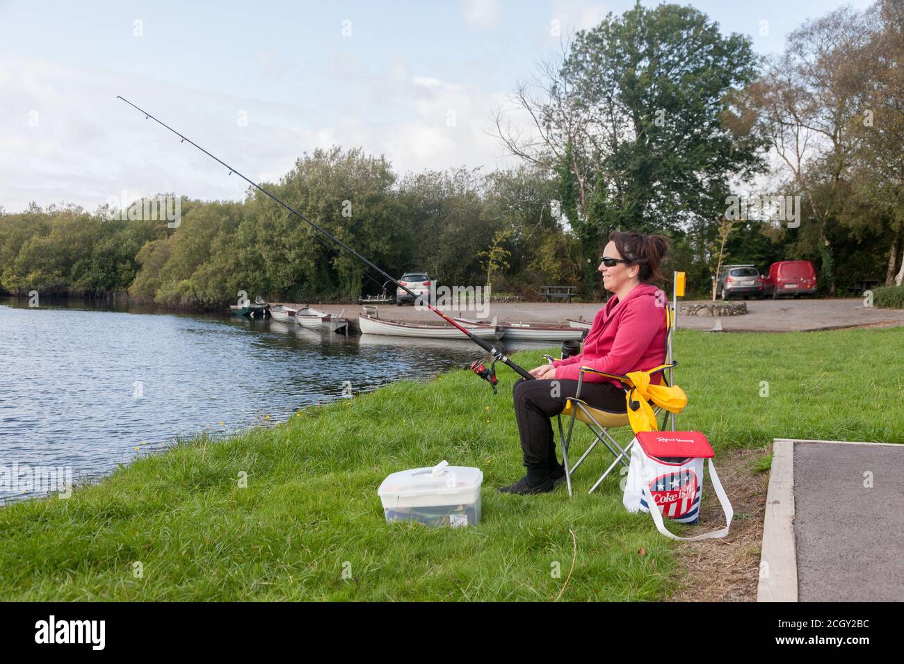 Inchigeelagh, Cork, Ireland. 12th September, 2020. Clare O' Connor from Coachford spending a relaxing afternoon course fishing on Lough Aulla outside Inchigeelagh, Co. Cork, Ireland. - Credit; David Creedon / Alamy Live News Stock Photo