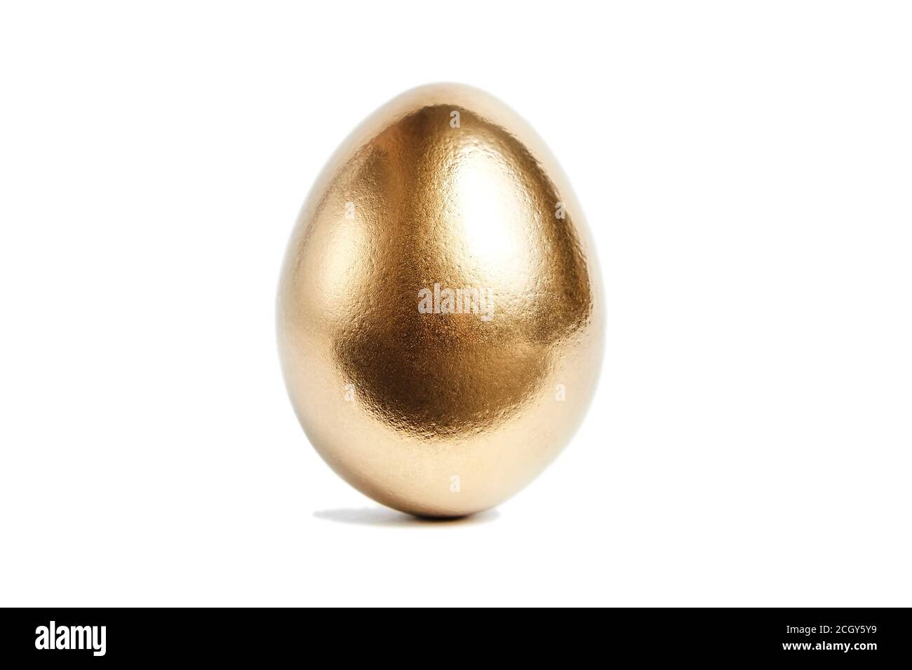 One golden egg isolated on white background. Conceptual image Stock Photo