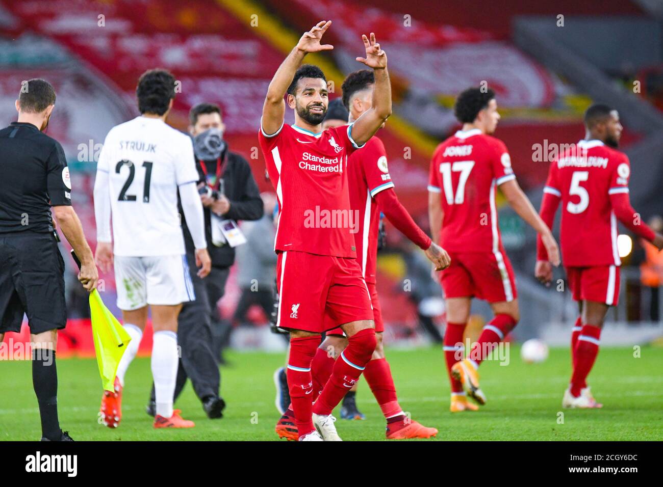 Liverpool forward Mohamed Salah (11) gestures for his hat-trick ball after the English championship Premier League football match between Liverpool an Stock Photo