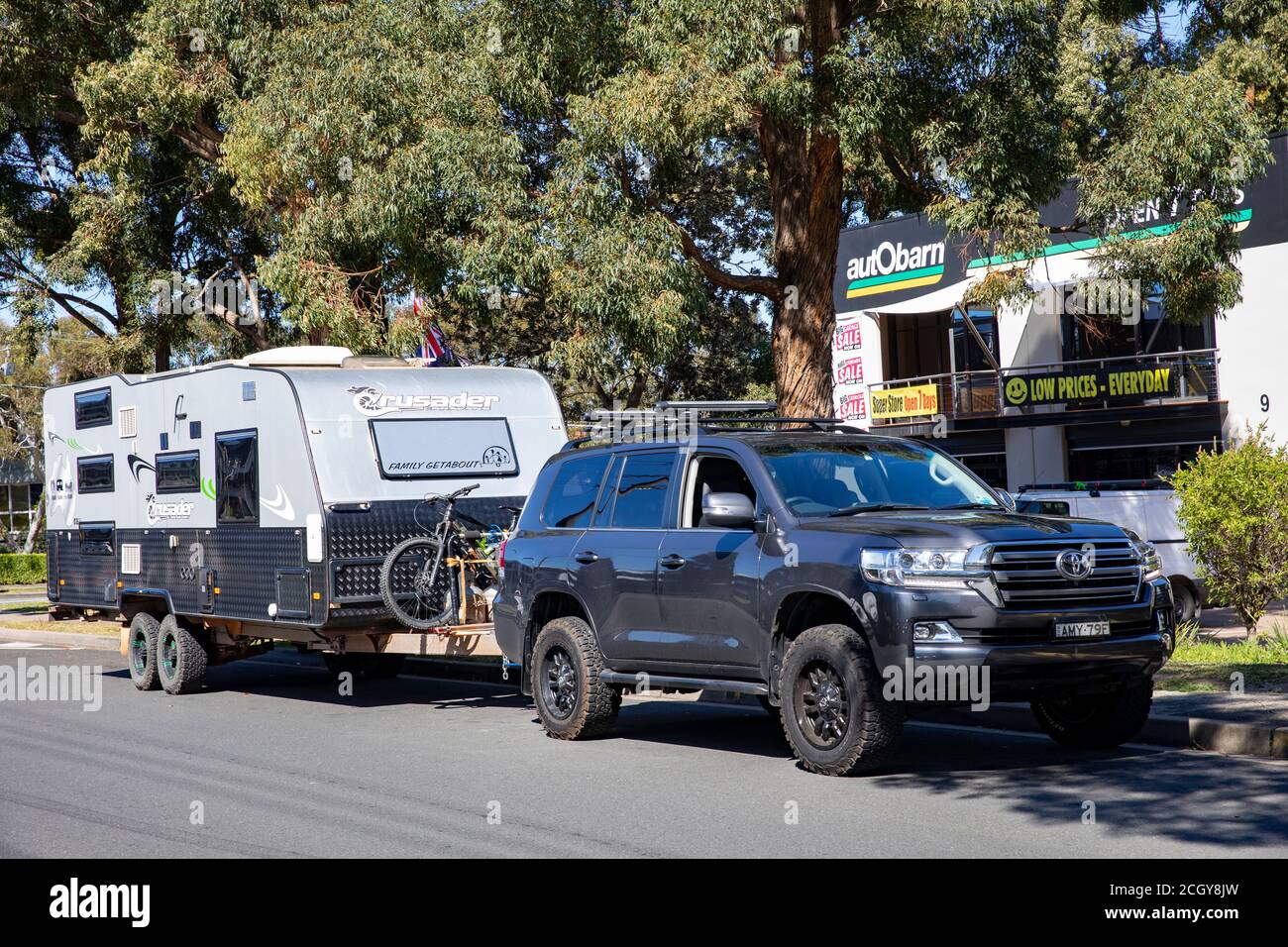 Touring and overlanding set up, Toyotas landcruiser tows a camper caravan unit,Sydney,Australia Stock Photo