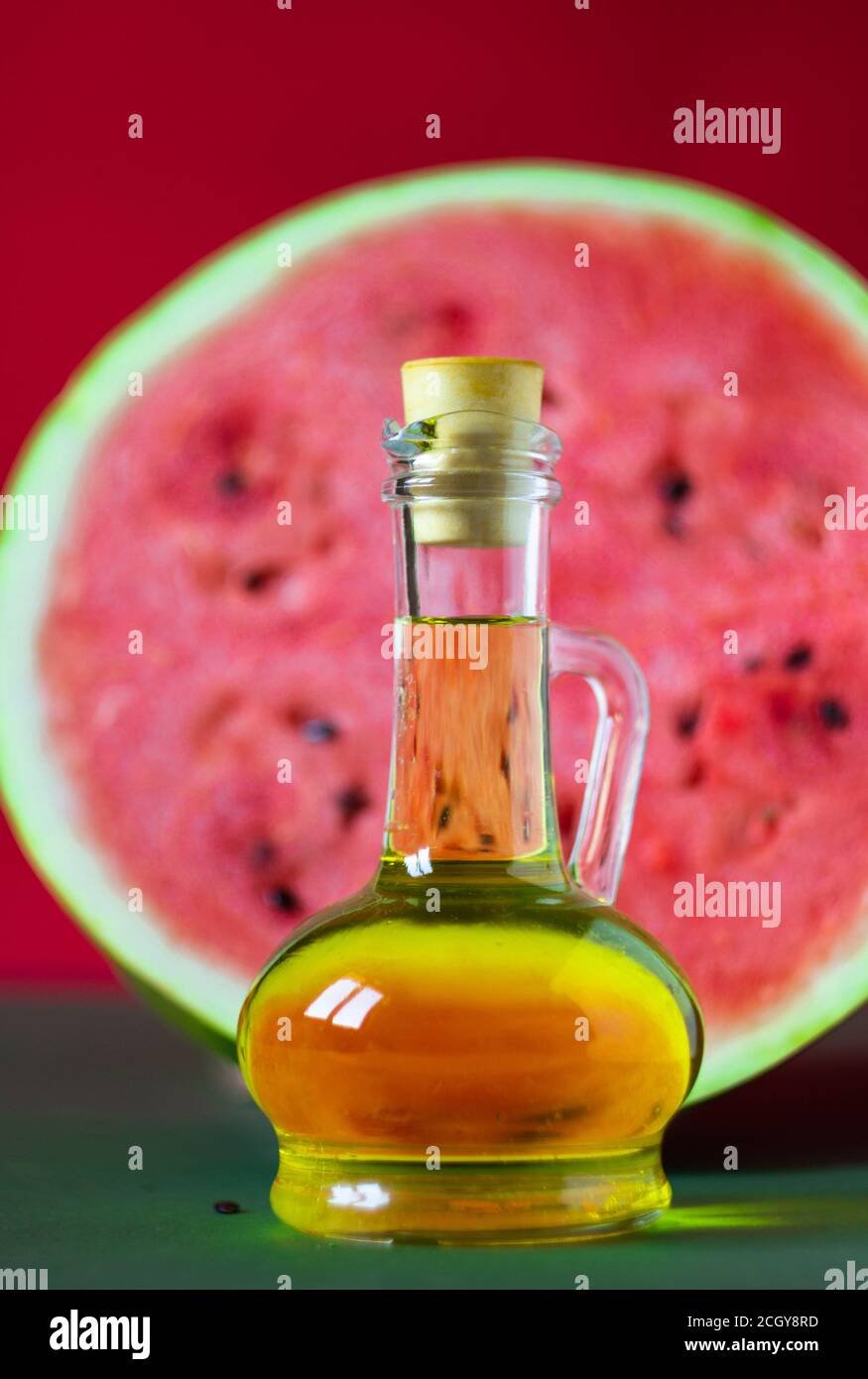 Watermelon seed oil in a glass jar Stock Photo Alamy