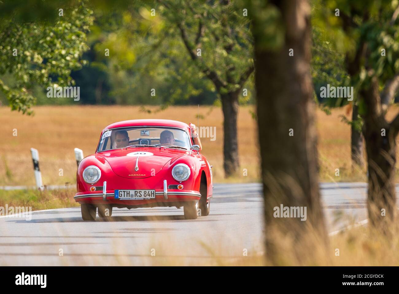 Saupsdorf, Germany. 12th Sep, 2020. Rainer Seyfarth and Matthias Dorl drive their Porsche with the starting number 20 at the 8th Rallye Elbflorenz 2020 on the track in Saxon Switzerland. A total of 198 vehicles are taking part. Credit: Daniel Schäfer/dpa-Zentralbild/dpa/Alamy Live News Stock Photo